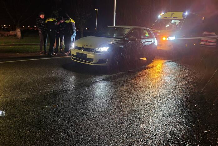 Schade na botsing tussen auto en bestelbus