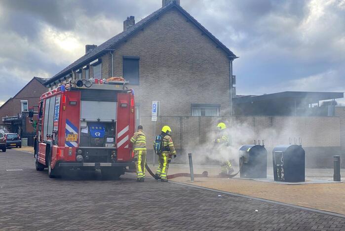 Ondergrondse container in brand