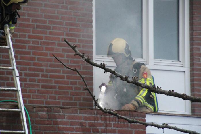 Brand in afzuigkap van woning