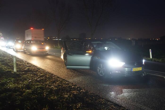 Personenauto in botsing met bestelbus