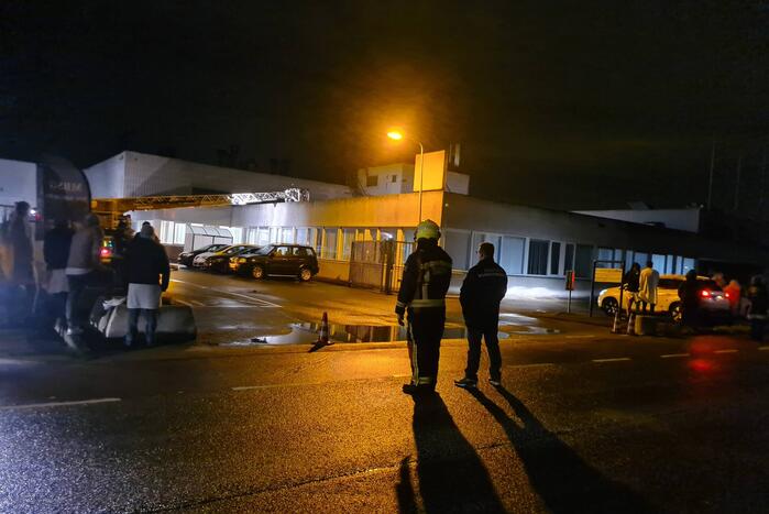 Brand in oven slaat door in schoorsteen