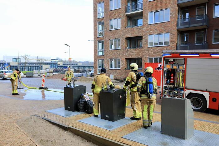 Brand in ondergrondse PMD-container
