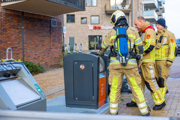 Brand in ondergrondse PMD-container