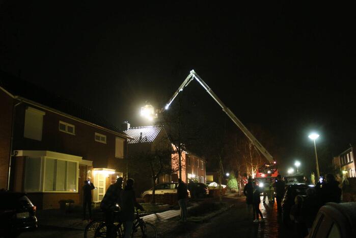 Brand in schoorsteen van woning
