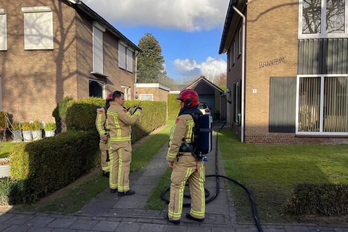 Brand in schuur achter woning