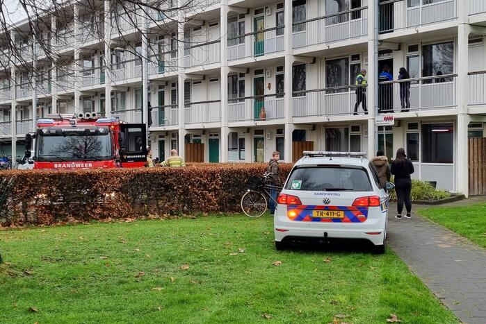 Brand in keuken van flatwoning