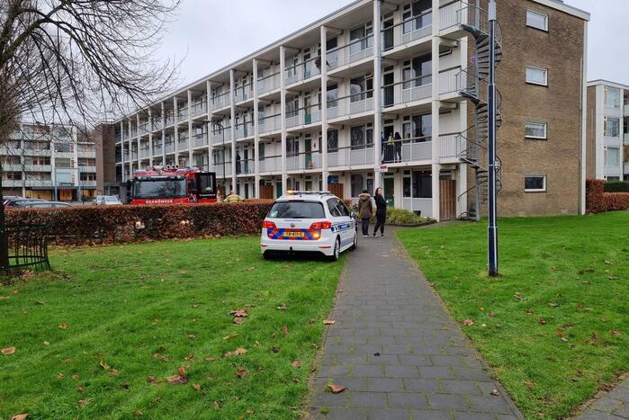 Brand in keuken van flatwoning