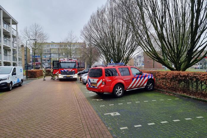 Brand in keuken van flatwoning