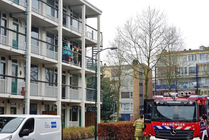 Brand in keuken van flatwoning