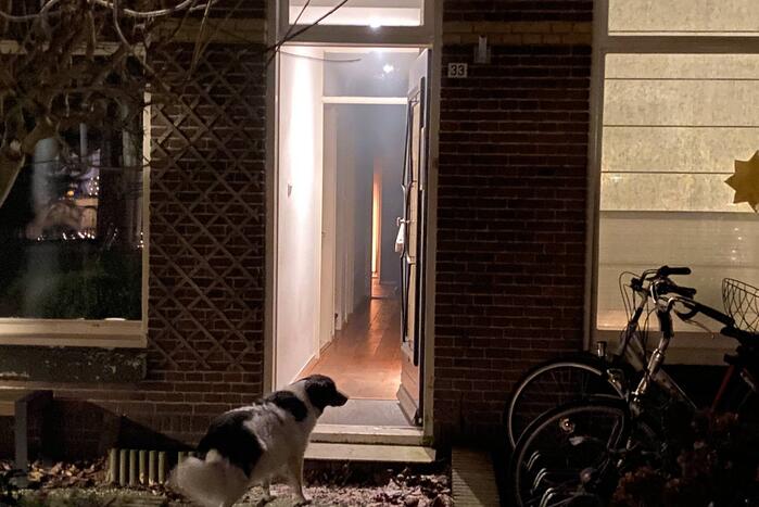 Grote vlammen door brand in bijkeuken