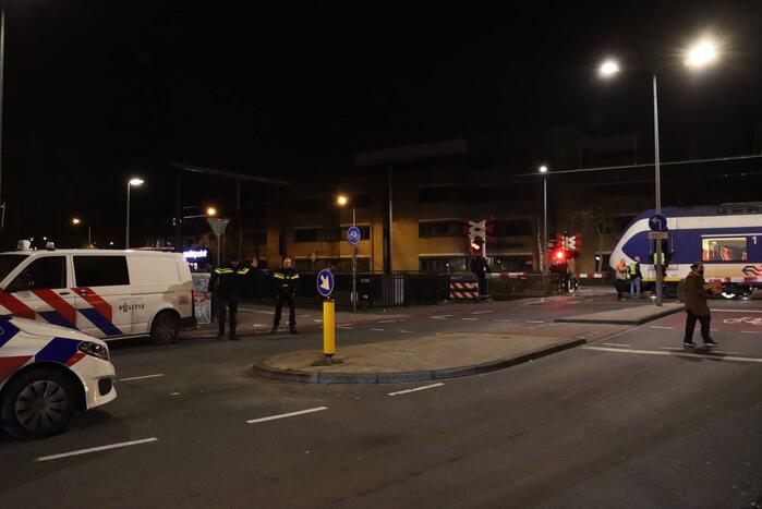 Scooter aangereden door trein