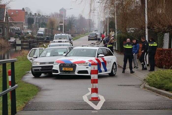 Auto klemgereden na achtervolging