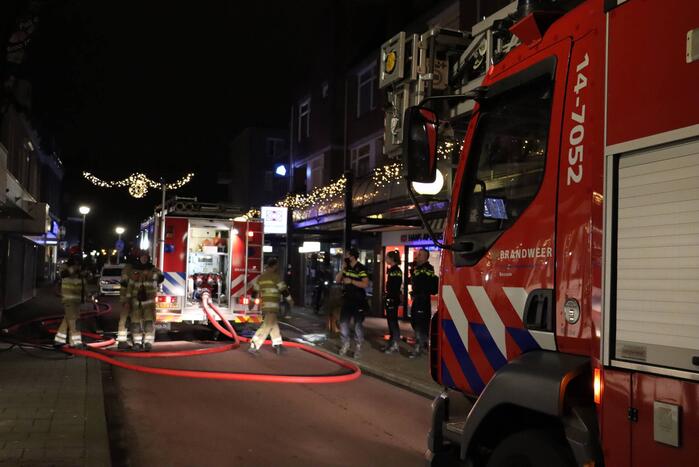 Korte felle wasmachinebrand in bovenwoning