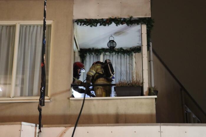 Korte felle wasmachinebrand in bovenwoning