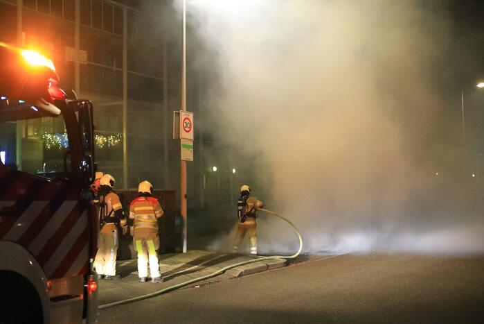 Meerdere pallets in brand gestoken