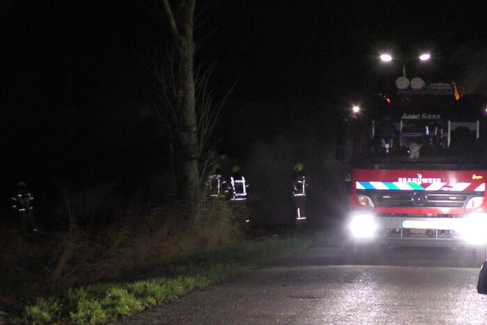 Grote stapel pallets in brand