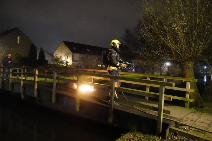 Brandstichting op houten brug