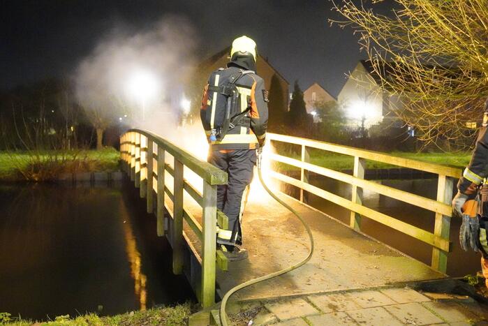 Brandstichting op houten brug