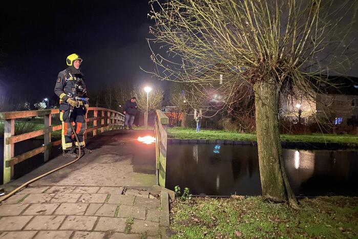 Brandstichting op houten brug
