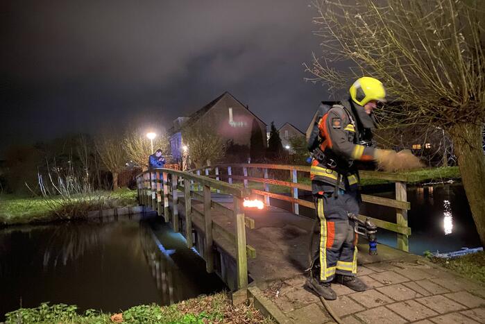 Brandstichting op houten brug