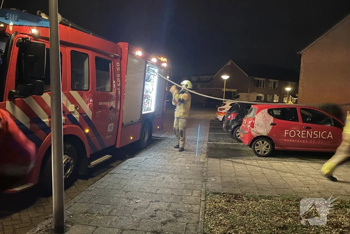 Brandweer blust buitenbrand