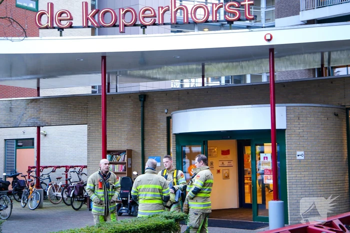 Brand in liftmachinekamer op elfde etage de Koperhorst