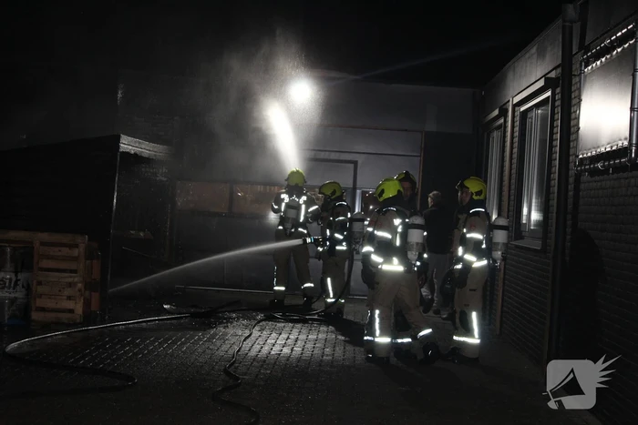 Houten overkapping in brand