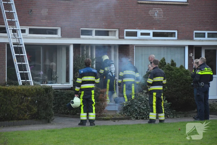 Woning vol rook door schoorsteenbrand