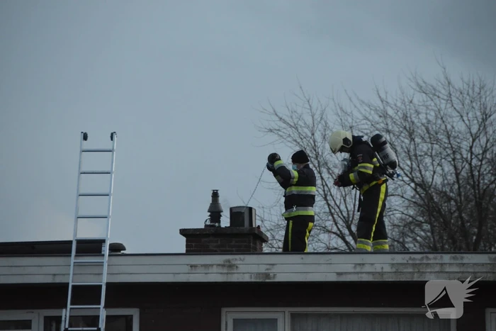 Woning vol rook door schoorsteenbrand