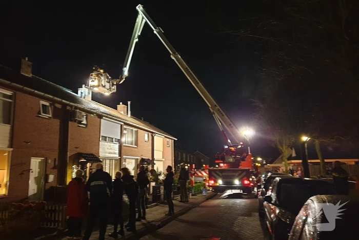Schoorsteen geveegd na brand