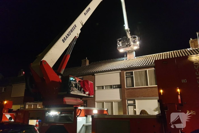 Schoorsteen geveegd na brand