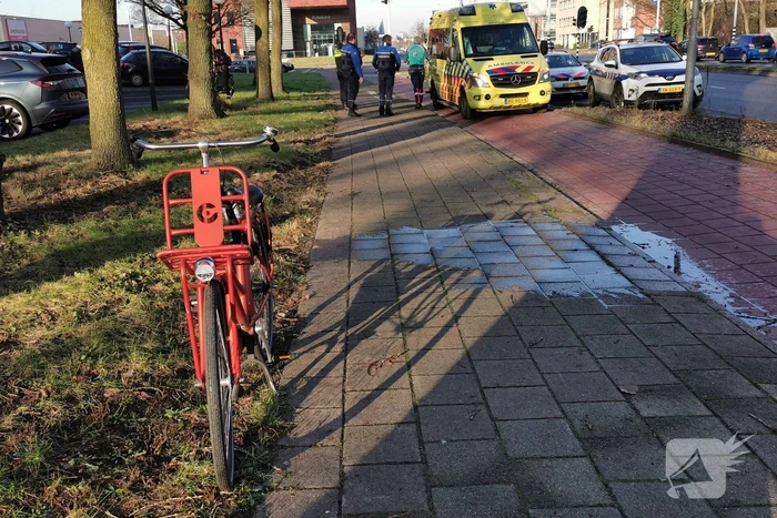 Persoon met hoofdwond op de grond