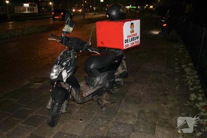 Twee maaltijd bezorgers met elkaar in botsing