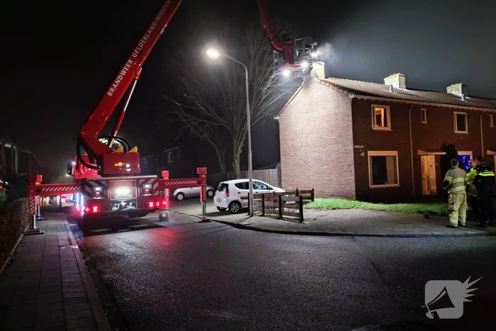 Brand in schoorsteen van woning