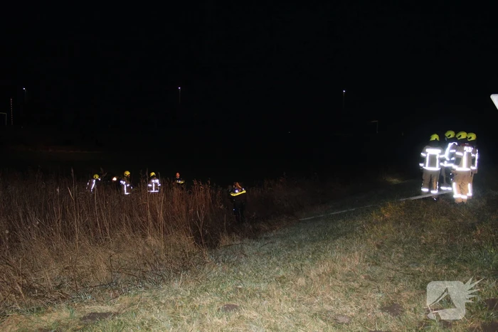 Personenauto belandt van de weg