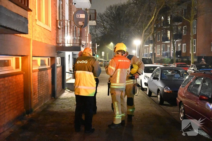 Man gewond bij woningbrand, parkiet overleden