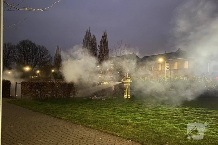 Handhaving blust brand in hoop afval