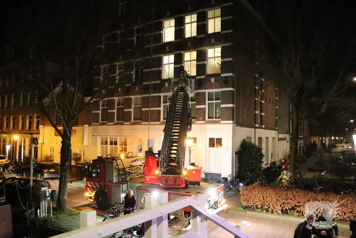 Portiekwoningen ontruimd door brand in spouwmuur