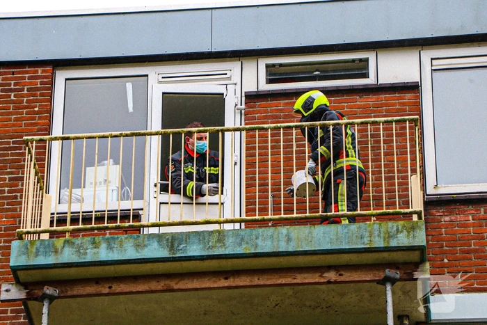 Ruit van balkondeur stuk door harde wind
