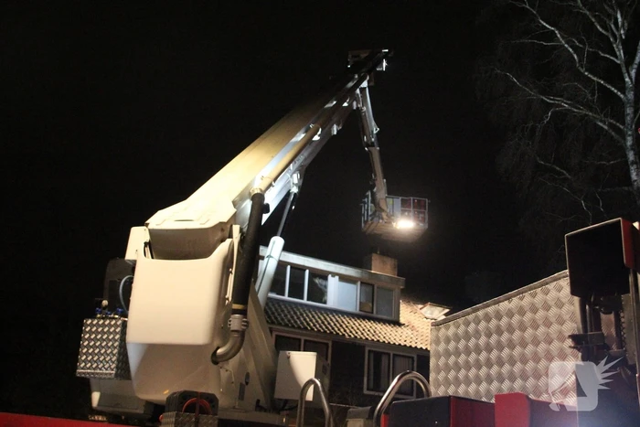 Brand in schoorsteen van woning
