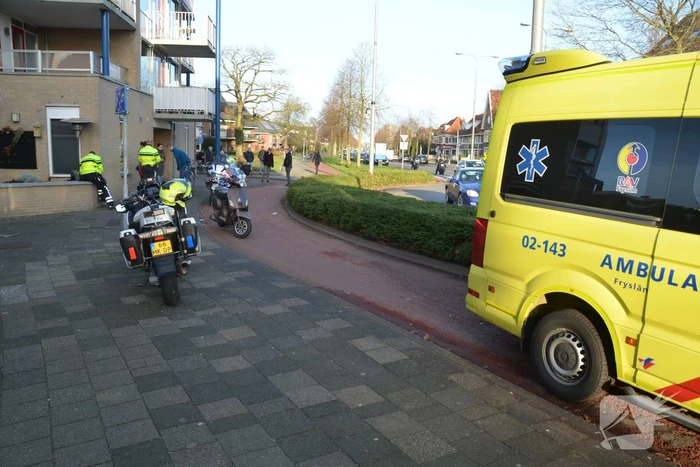 Scooter en fietser botsen op elkaar