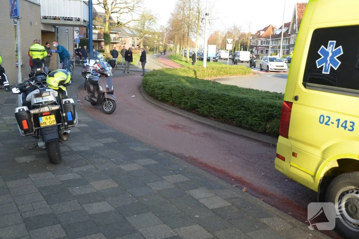 Scooter en fietser botsen op elkaar