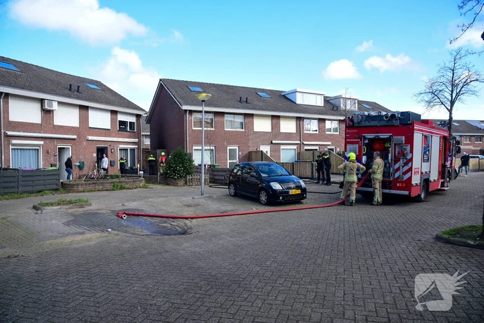Brand in achtertuin van woning