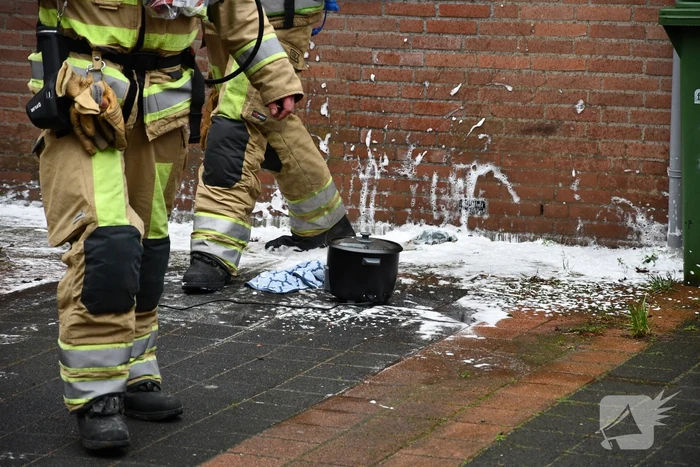 Rookontwikkeling door pannetje op vuur
