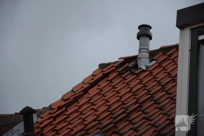 Dak waait van dakkapellen af