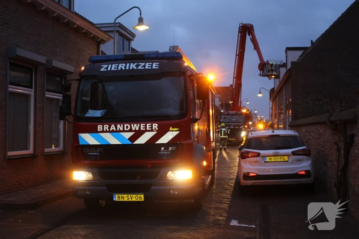 Dakbedekking van kerktoren laat los