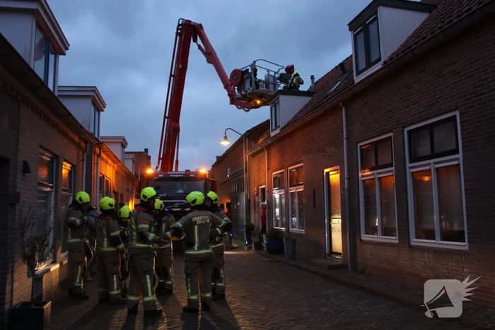 Dakbedekking van kerktoren laat los