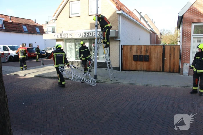 Sierverlichting verwijderd door de brandweer