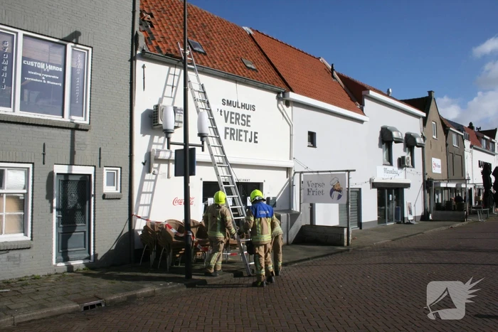 Brandweer ingezet voor stormschades in winkelgebied