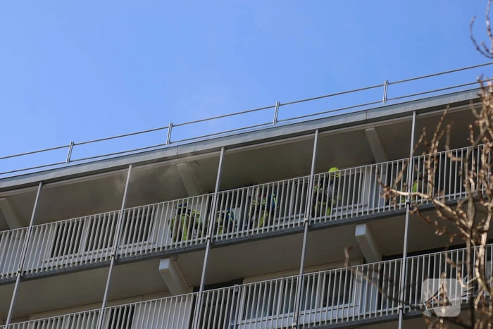 Brand op 12e verdieping van Eisenhouwerflat